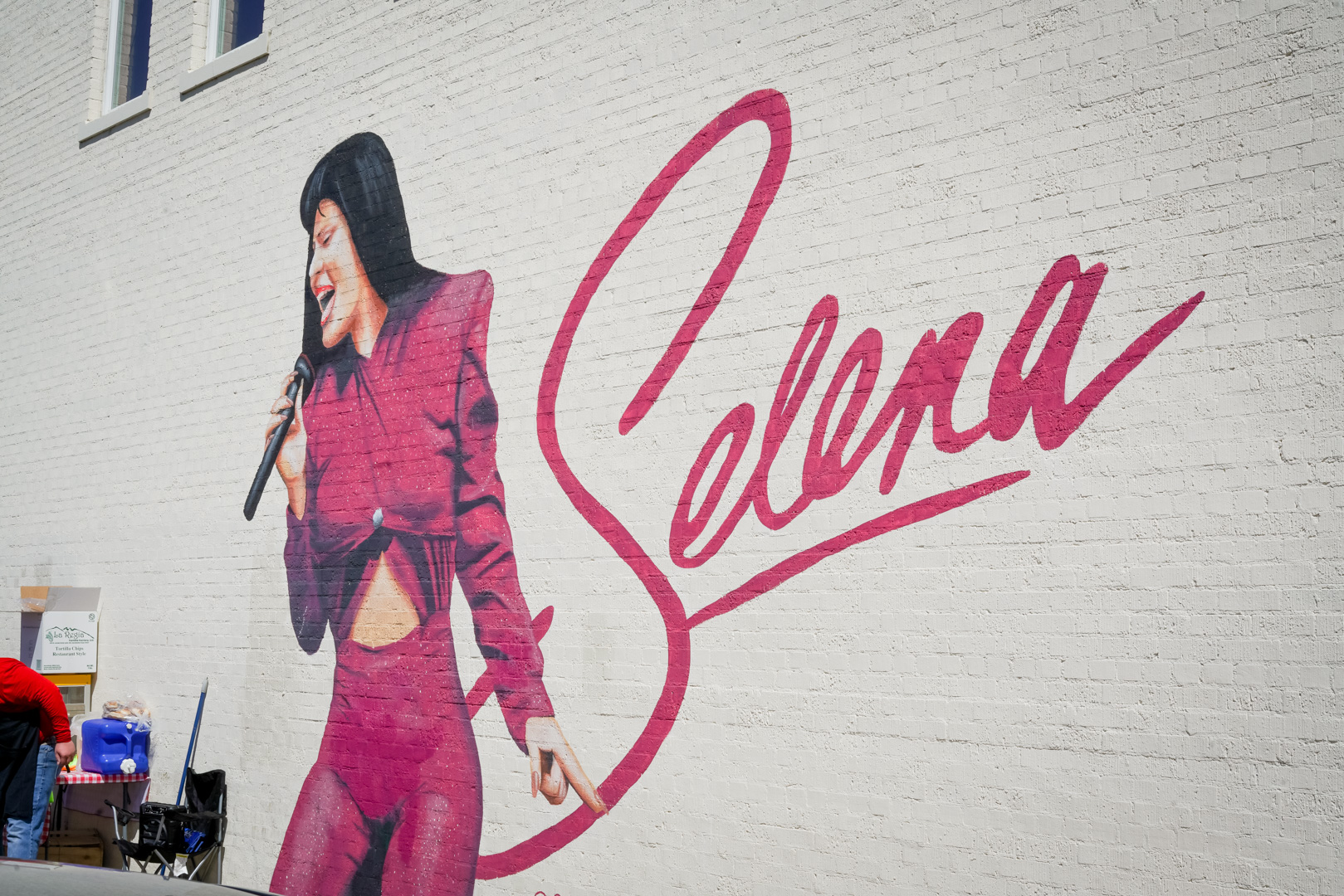 A pink mural of Selena