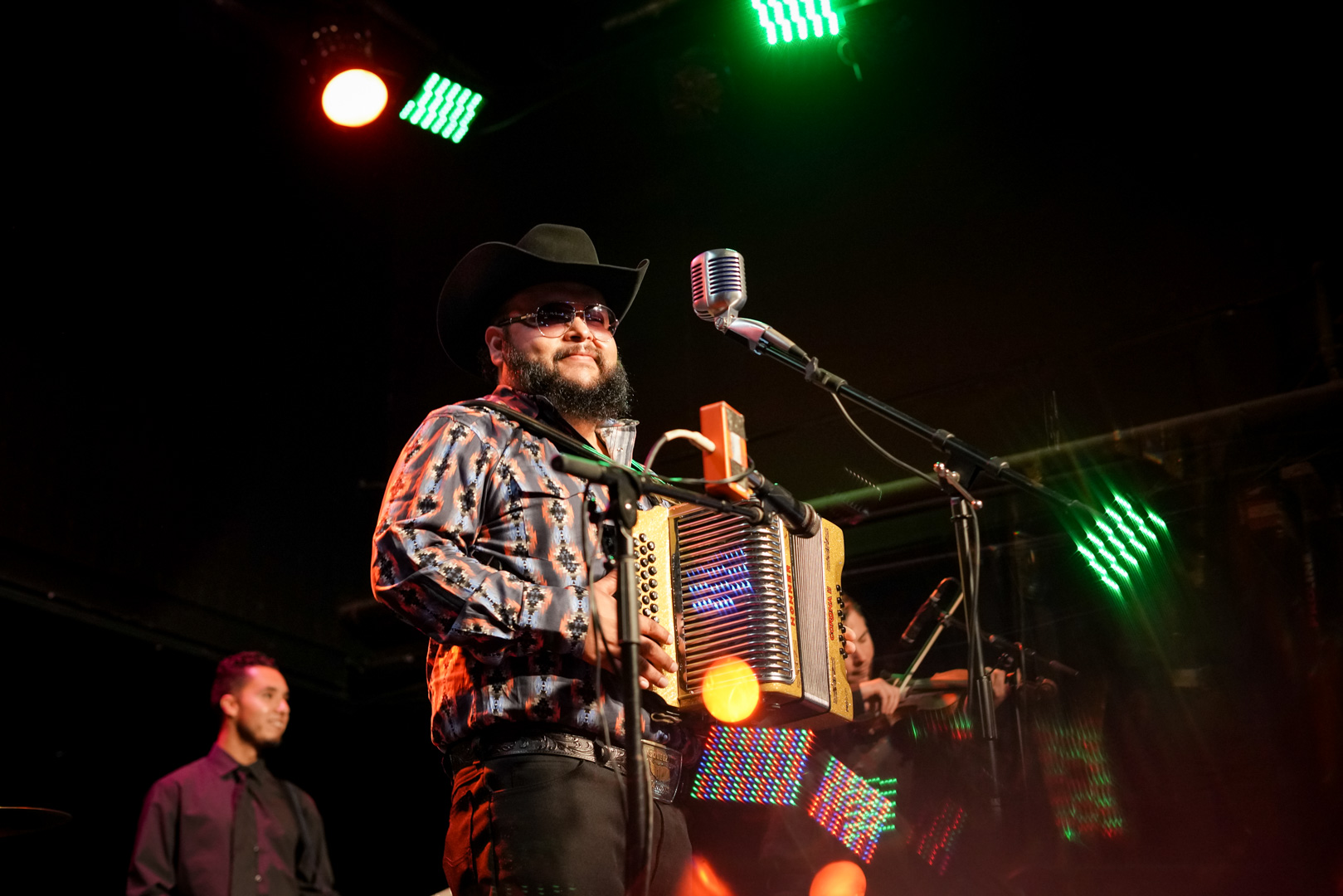 An accordion played smiles on stage