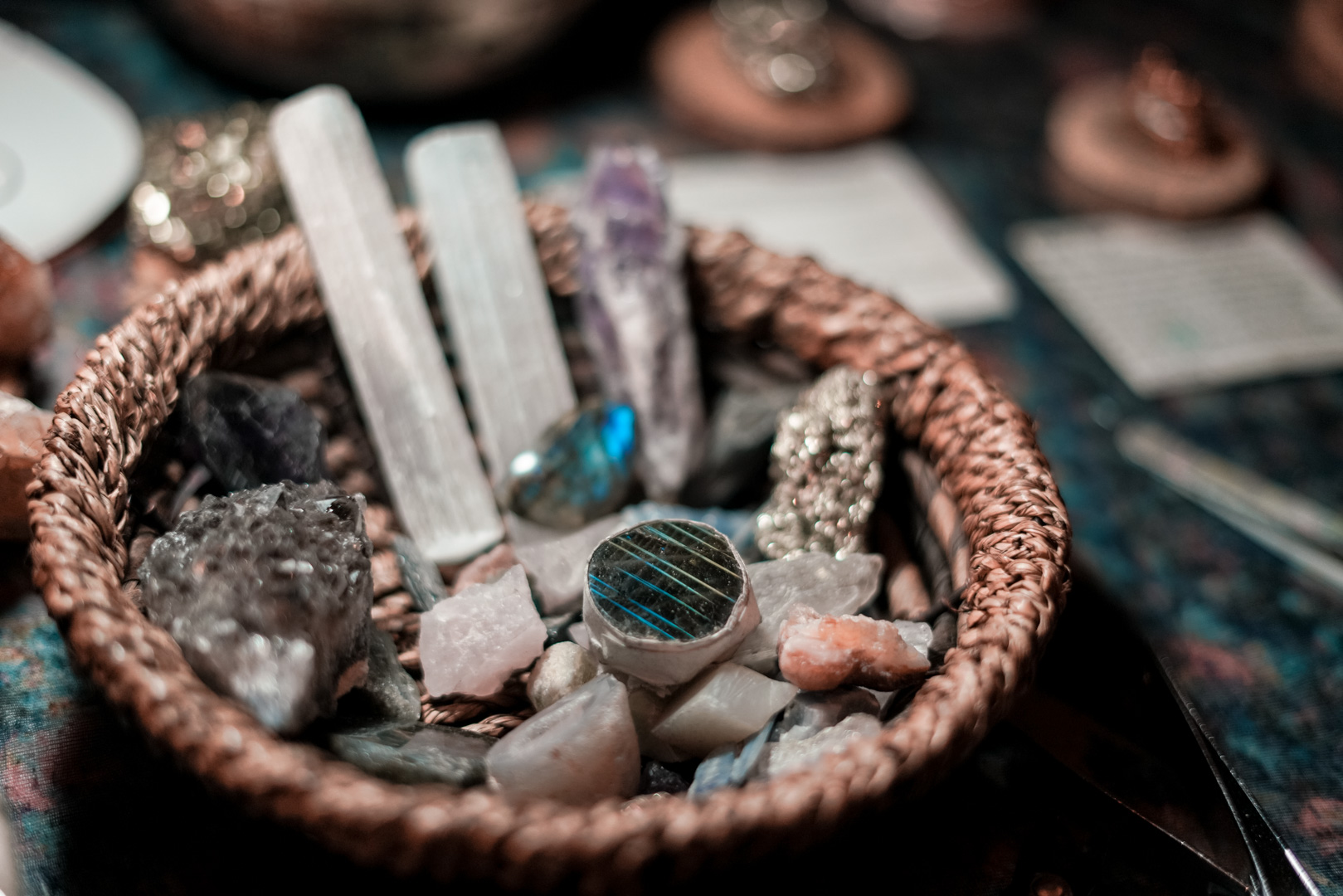 A small basket full of crystals
