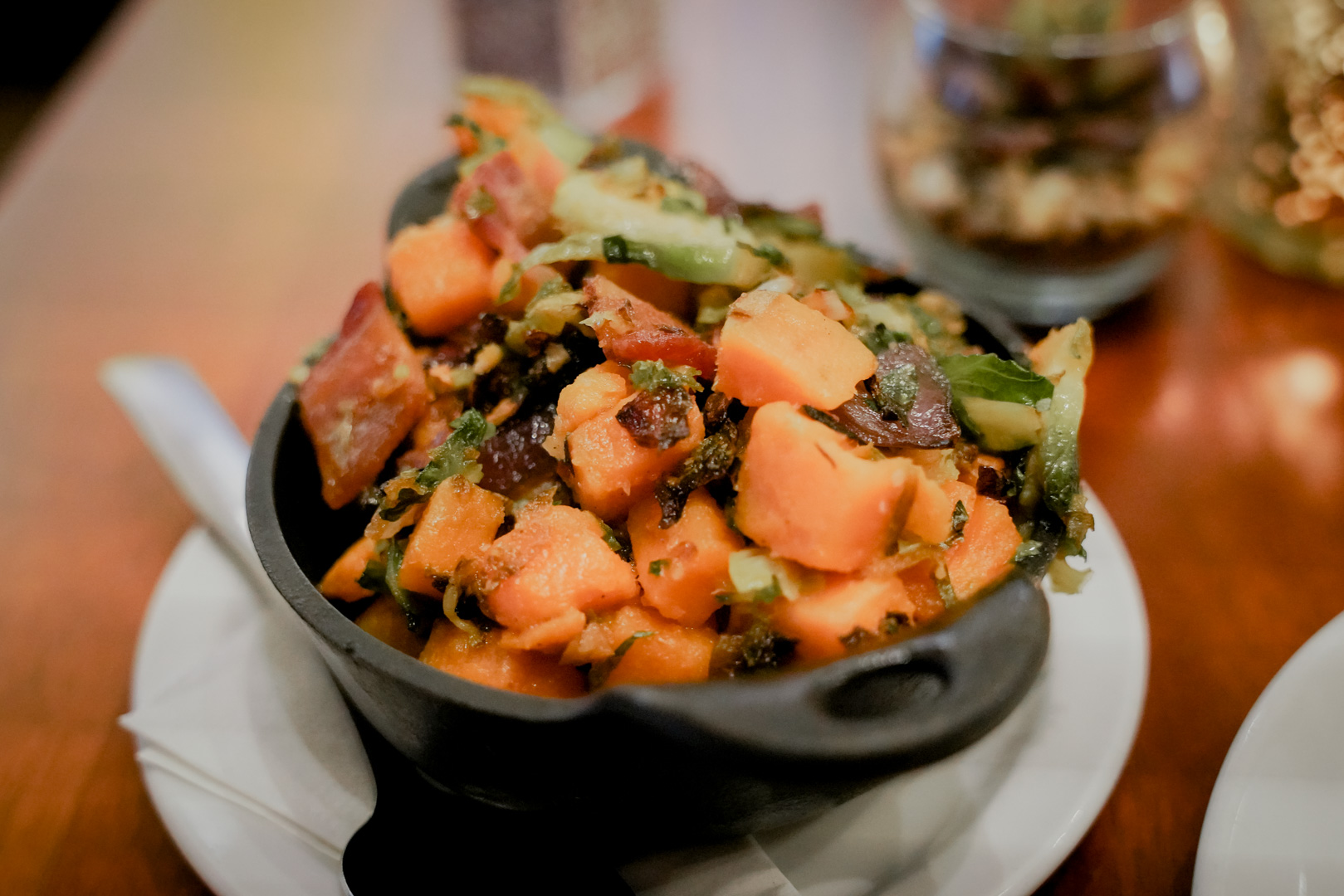 A hot dish served with sweet potato hash