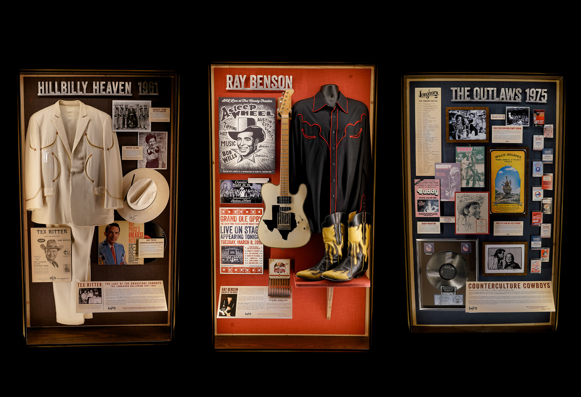 Three shadow boxes with music history artifacts
