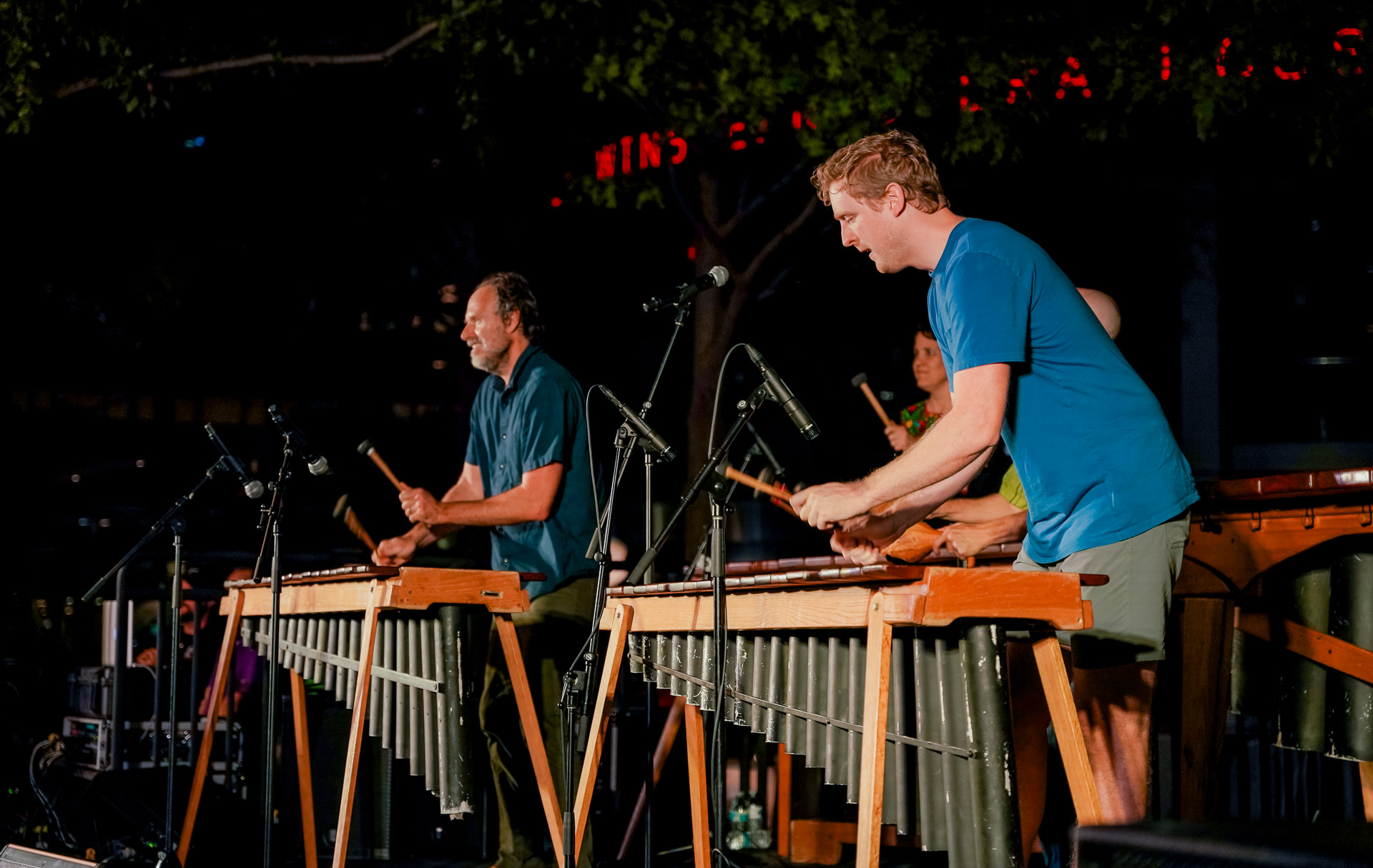 People playing marimbas