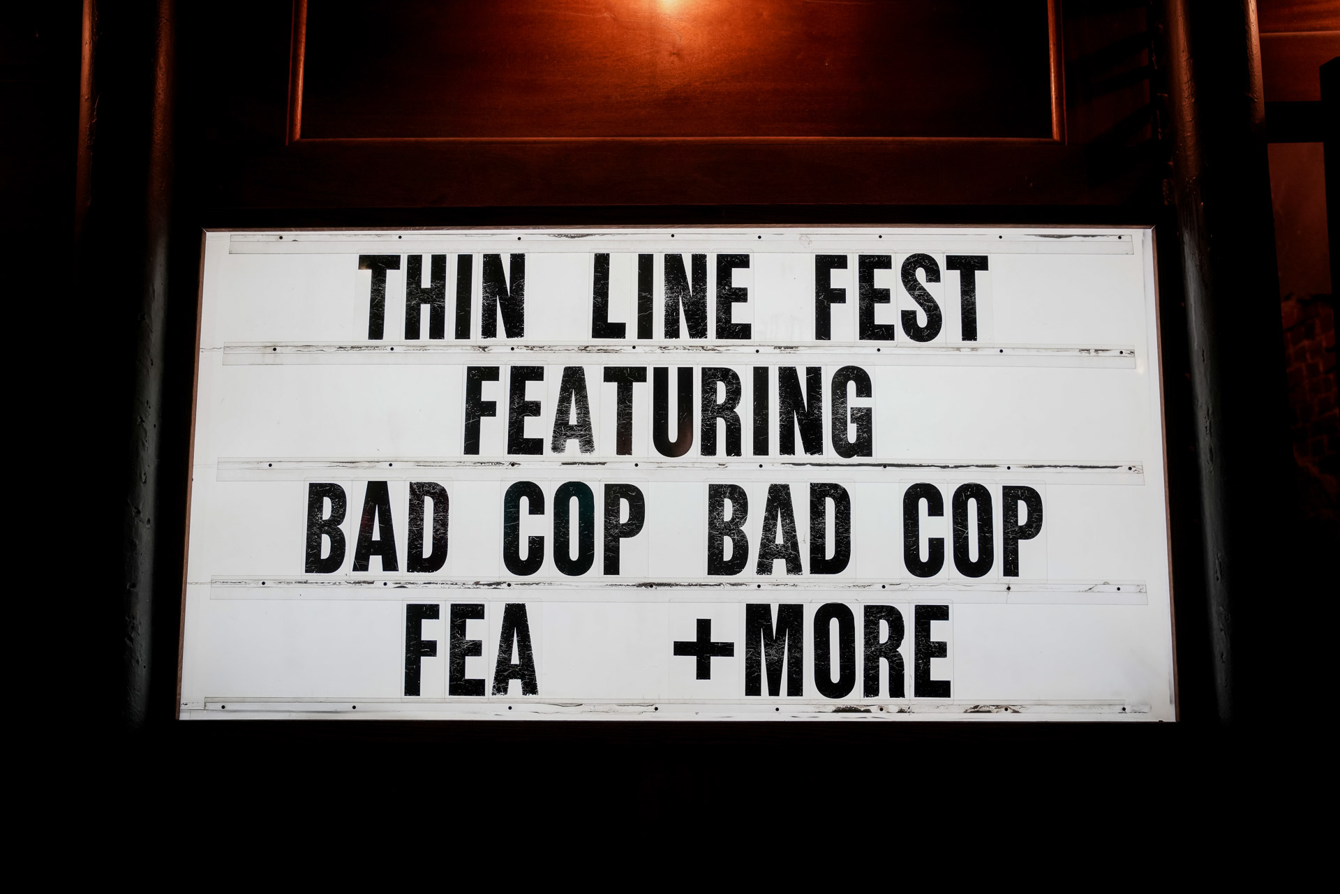A marquee with band names
