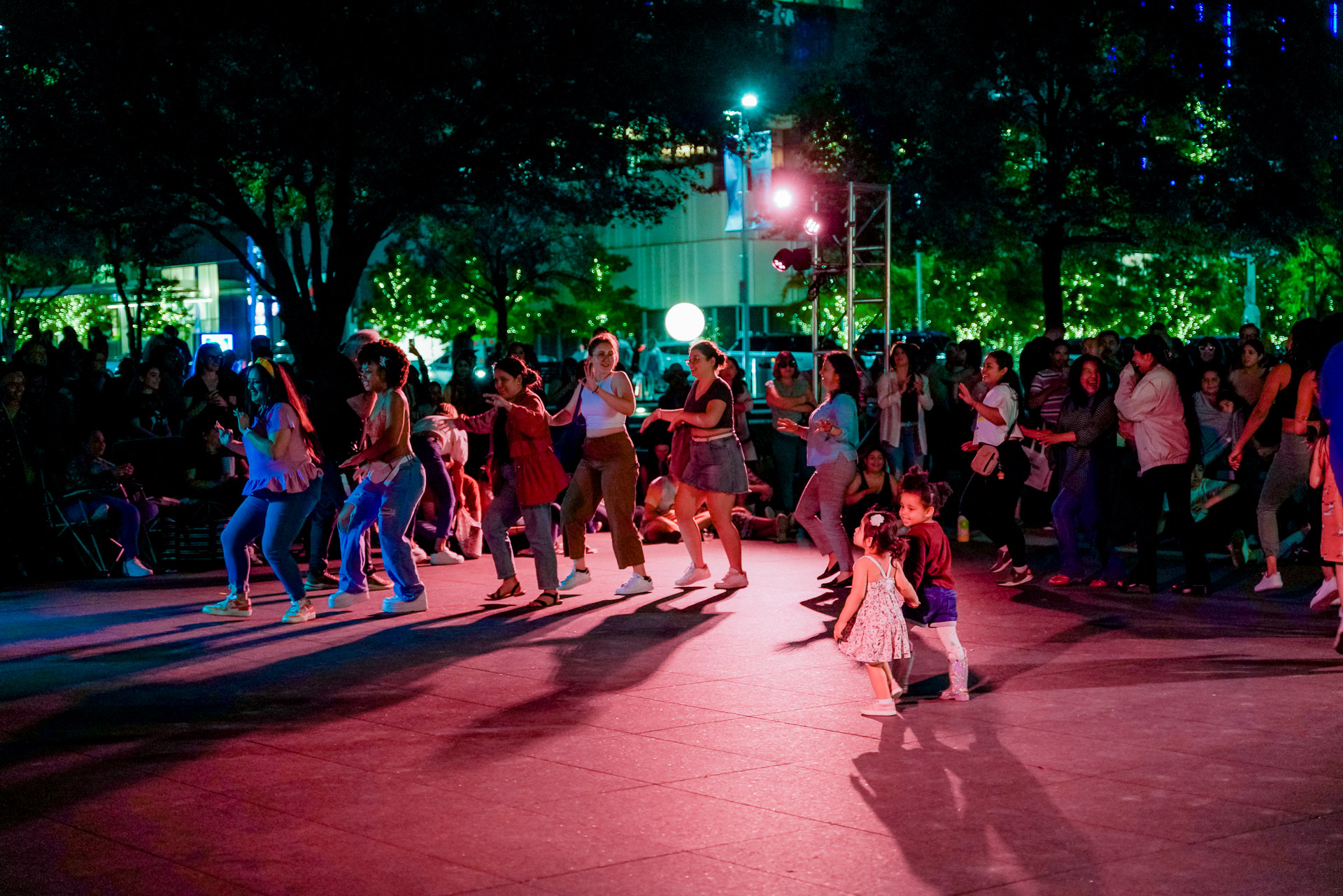 People dancing on an outdoor dance floor