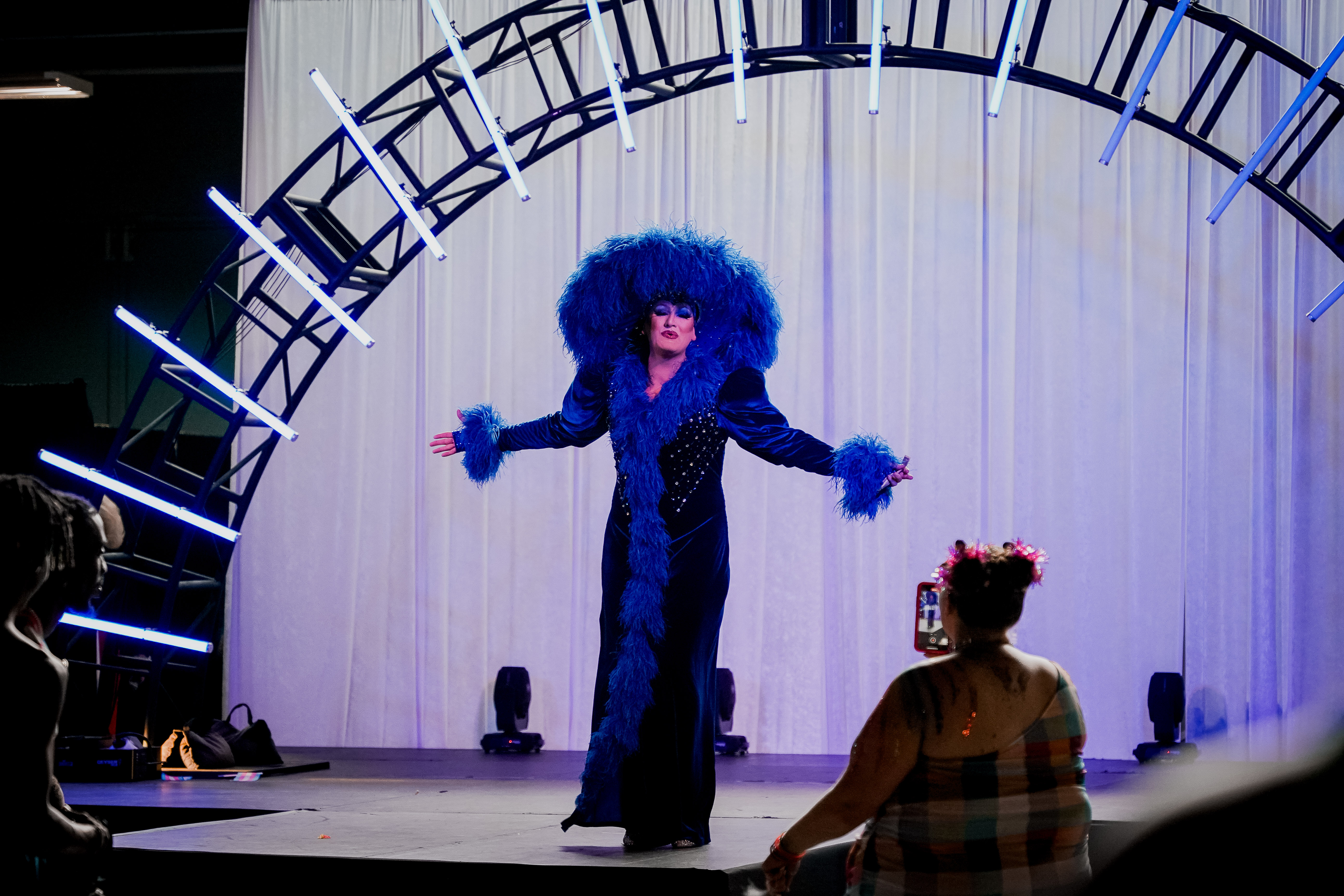 A drag performer on stage