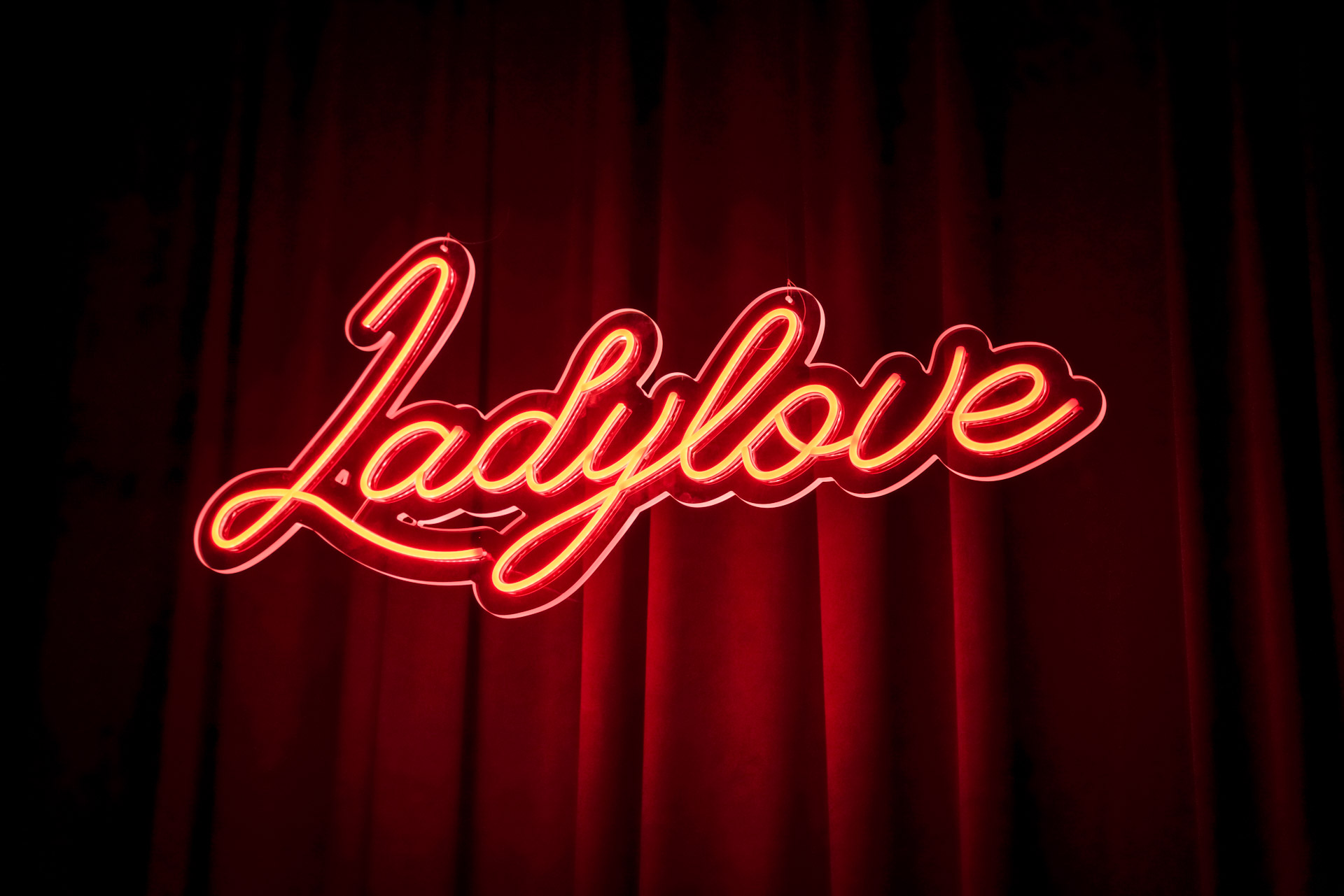 A neon sign that says Ladylove