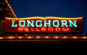 A neon sign that says Longhorn Ballroom