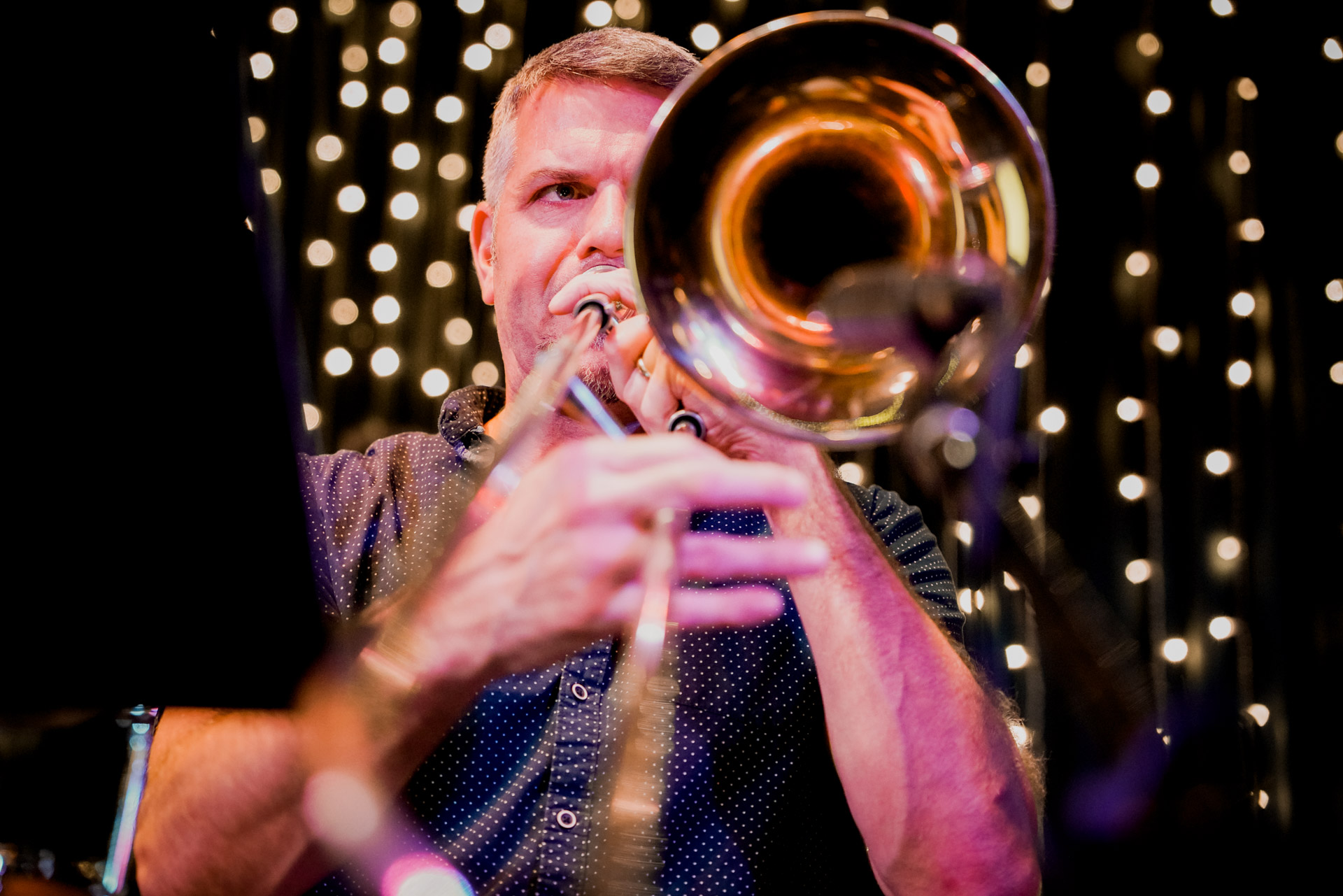 A trombone player on stage