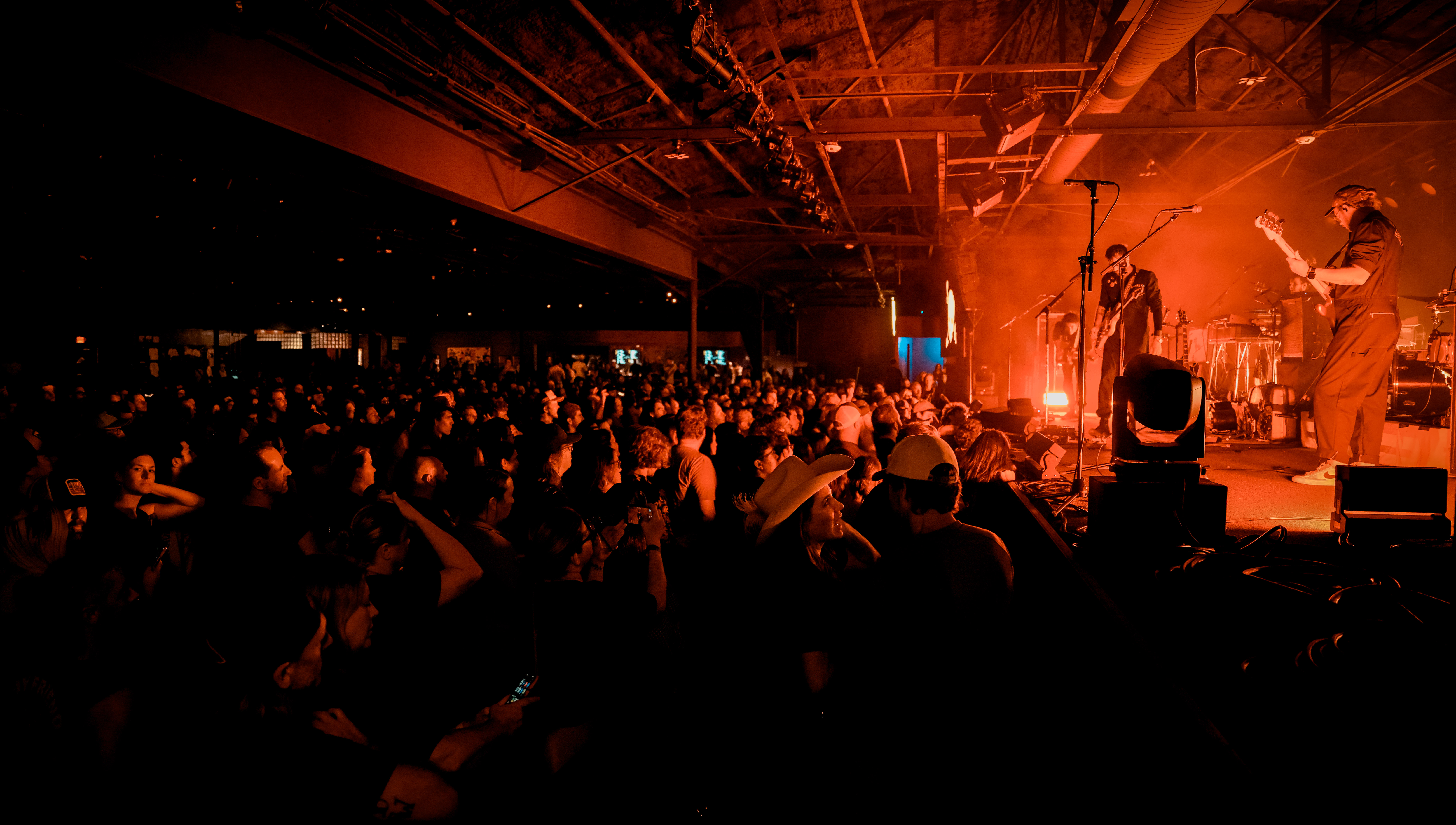 A full crowd in front of a stage