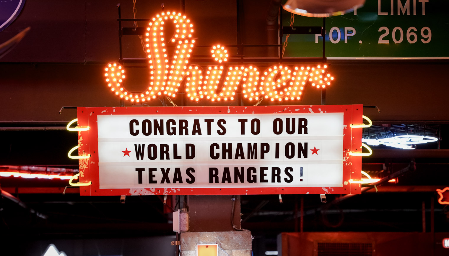 A marquee sign that says "Congrats to our world champion Texas rangers"