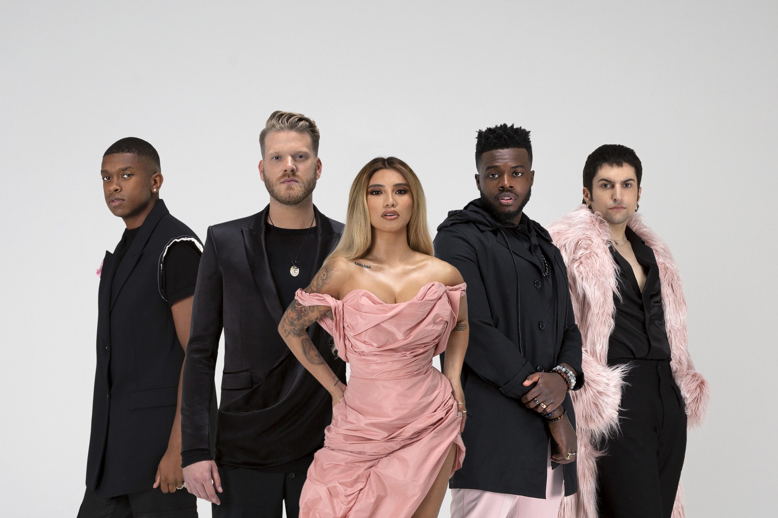 Pentatonix stands in front of an all-white backdrop