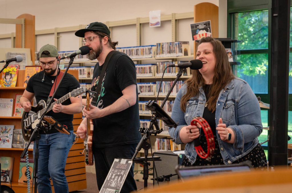 A full band inside a library